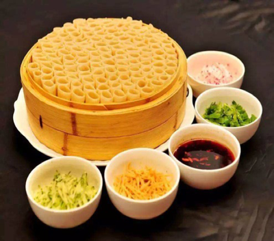 山西蒸籠里面的藝術感,遠看像一幅抽象畫,原來是一道美食小吃